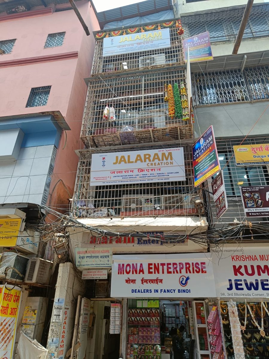 Jalaram Creation building at 3rd Bhoiwada, Bhuleshwar, Mumbai, with Jalaram Creation signboards on the 1st and 3rd floors